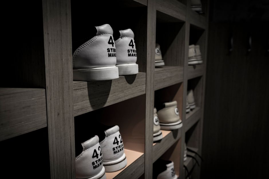 Organized shoe shelf inside a custom closet